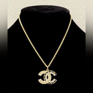 Gold Pendant on unbranded Necklace